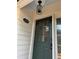 Charming front door with glass panels, house number display, and a modern lock at 3133 Rebecca St, Covington, GA 30014