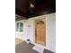 Up close view of the front door with light brick and black accents at 3133 Rebecca St, Covington, GA 30014