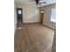 Living room featuring wood-look floors and updated lighting at 3133 Rebecca St, Covington, GA 30014