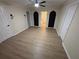 A room featuring hardwood flooring and arched shelving at 3133 Rebecca St, Covington, GA 30014
