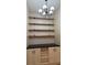 A bar features overhead shelving and a beverage serving area at 3133 Rebecca St, Covington, GA 30014
