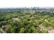 Expansive aerial view showcasing lush greenery and the city skyline at 540 Atwood Sw St, Atlanta, GA 30310