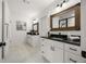 Spacious bathroom with double vanities, framed mirrors, and stylish lighting fixtures at 540 Atwood Sw St, Atlanta, GA 30310