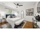Stylishly furnished bedroom with a plush bed, modern decor, and ample natural light at 540 Atwood Sw St, Atlanta, GA 30310