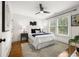 Cozy bedroom with a large window, hardwood floors, and modern decor at 540 Atwood Sw St, Atlanta, GA 30310