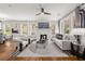 Inviting living room featuring hardwood floors, stylish furniture, and ample natural light at 540 Atwood Sw St, Atlanta, GA 30310