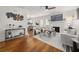 Cozy living room with hardwood floors, a fireplace, and abundant natural light at 540 Atwood Sw St, Atlanta, GA 30310