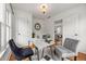 Stylish office with a modern desk, neutral chairs, and abundant natural light at 540 Atwood Sw St, Atlanta, GA 30310