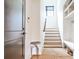 Bright entryway with hardwood floors, stairs and built-in storage at 797 Greenwood Ne Ave, Atlanta, GA 30306