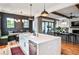 Bright kitchen features a large island, stainless steel appliances, a breakfast nook, and hardwood floors at 797 Greenwood Ne Ave, Atlanta, GA 30306