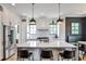 Modern kitchen with white cabinetry, stainless steel appliances, and a spacious island at 797 Greenwood Ne Ave, Atlanta, GA 30306