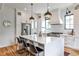 Modern kitchen features a large island, stainless steel appliances, and hardwood floors at 797 Greenwood Ne Ave, Atlanta, GA 30306