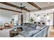Spacious living area with wood beams, flows into the kitchen and dining room at 797 Greenwood Ne Ave, Atlanta, GA 30306