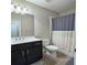 Charming bathroom with a shower-tub combo and a modern vanity at 2128 Sonoma Se Dr, Smyrna, GA 30080
