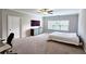 Spacious bedroom with a ceiling fan, ample natural light, and neutral decor at 2128 Sonoma Se Dr, Smyrna, GA 30080