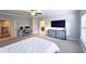 Large bedroom featuring a ceiling fan, neutral decor, and plenty of space for a home office at 2128 Sonoma Se Dr, Smyrna, GA 30080