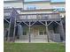 Spacious back patio with green space and shade at 2128 Sonoma Se Dr, Smyrna, GA 30080