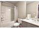 Clean bathroom featuring a shower-tub combo, toilet, and vanity with a mirror at 3401 Endurance Ct # 10, Atlanta, GA 30349