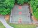 Community basketball court surrounded by trees and green space at 3722 Somerset Nw Rdg, Kennesaw, GA 30144