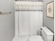 Bathroom with shower curtain and toilet at 3722 Somerset Nw Rdg, Kennesaw, GA 30144
