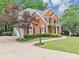 Lovely brick home with well-kept lawn, landscaping, and spacious driveway at 3722 Somerset Nw Rdg, Kennesaw, GA 30144