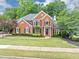 Beautiful two-story brick home features a well-maintained lawn and inviting curb appeal at 3722 Somerset Nw Rdg, Kennesaw, GA 30144