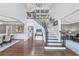 Grand foyer featuring a staircase, hardwood floors, and soaring ceilings at 3722 Somerset Nw Rdg, Kennesaw, GA 30144
