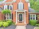 Close-up of a beautiful front door with decorative glass and elegant white pillars at 3722 Somerset Nw Rdg, Kennesaw, GA 30144