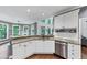 Bright kitchen featuring stainless steel appliances, white cabinets, and granite countertops at 3722 Somerset Nw Rdg, Kennesaw, GA 30144