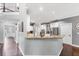 Bright kitchen with granite countertops, stainless steel appliances, and modern cabinets at 3722 Somerset Nw Rdg, Kennesaw, GA 30144