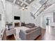 Bright living room with high ceilings, large windows, a fireplace, and comfortable seating arrangement at 3722 Somerset Nw Rdg, Kennesaw, GA 30144