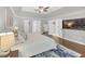 Bright main bedroom with hardwood floors, ceiling fan, and plenty of natural light at 3722 Somerset Nw Rdg, Kennesaw, GA 30144