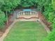 Aerial view of community outdoor amphitheater surrounded by lush trees at 3722 Somerset Nw Rdg, Kennesaw, GA 30144