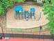 Community playground with blue and green play structure and safety enclosure at 3722 Somerset Nw Rdg, Kennesaw, GA 30144