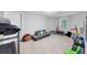 Bright playroom with a sofa, natural light and assorted toys and activities at 3722 Somerset Nw Rdg, Kennesaw, GA 30144