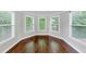 Cozy sitting area with hardwood floors, multiple windows, and bright, natural lighting at 3722 Somerset Nw Rdg, Kennesaw, GA 30144