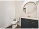 Stylish half-bathroom featuring a modern vanity and updated fixtures at 3901 High Dove Sw Way # 17, Smyrna, GA 30082