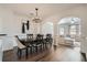 Elegant dining room featuring dark wood floors, stylish lighting, and serene decor at 3901 High Dove Sw Way # 17, Smyrna, GA 30082