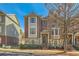 Brick and stone townhome with manicured landscaping and inviting front entrance at 3901 High Dove Sw Way # 17, Smyrna, GA 30082