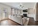 Bright living room boasts a fireplace, plush seating, and backyard access at 3901 High Dove Sw Way # 17, Smyrna, GA 30082