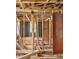 Unfinished house interior with visible framing, stairs and door at 415 Gray Rd, Carrollton, GA 30116