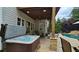 Back patio with hot tub and seating area at 1657 Millhouse Lndg, Marietta, GA 30066