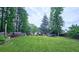 Large, meticulously maintained backyard with a lush lawn, perfect for outdoor activities and relaxation at 1657 Millhouse Lndg, Marietta, GA 30066