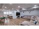 Spacious basement featuring a comfortable seating area and game tables for recreation and entertainment at 1657 Millhouse Lndg, Marietta, GA 30066