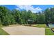 Outdoor basketball court with trees and a covered picnic area enhances this property's recreational amenities at 1657 Millhouse Lndg, Marietta, GA 30066
