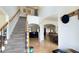 Spacious foyer with a staircase, hardwood floors, and an open layout to the dining area at 1657 Millhouse Lndg, Marietta, GA 30066