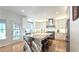 Beautiful kitchen with marble counter tops, white cabinets, stainless steel appliances, and a door to the backyard at 1657 Millhouse Lndg, Marietta, GA 30066