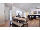 Spacious dining and living area with hardwood floors and neutral paint, open floor plan and lots of sunlight at 1657 Millhouse Lndg, Marietta, GA 30066