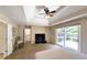 Generously sized main bedroom boasts a tray ceiling and deck access at 1657 Millhouse Lndg, Marietta, GA 30066