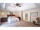 Relaxing main bedroom with soft neutral tones, tray ceiling and ensuite bath access at 1657 Millhouse Lndg, Marietta, GA 30066